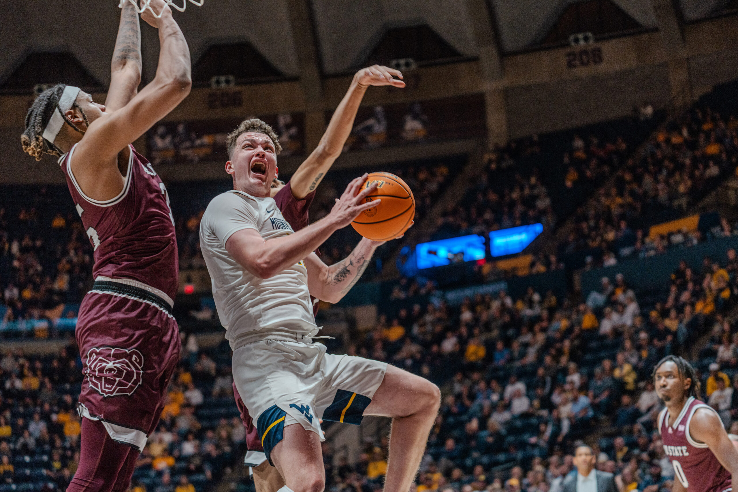 Mountaineers survive season debut behind Edwards and Slazinski